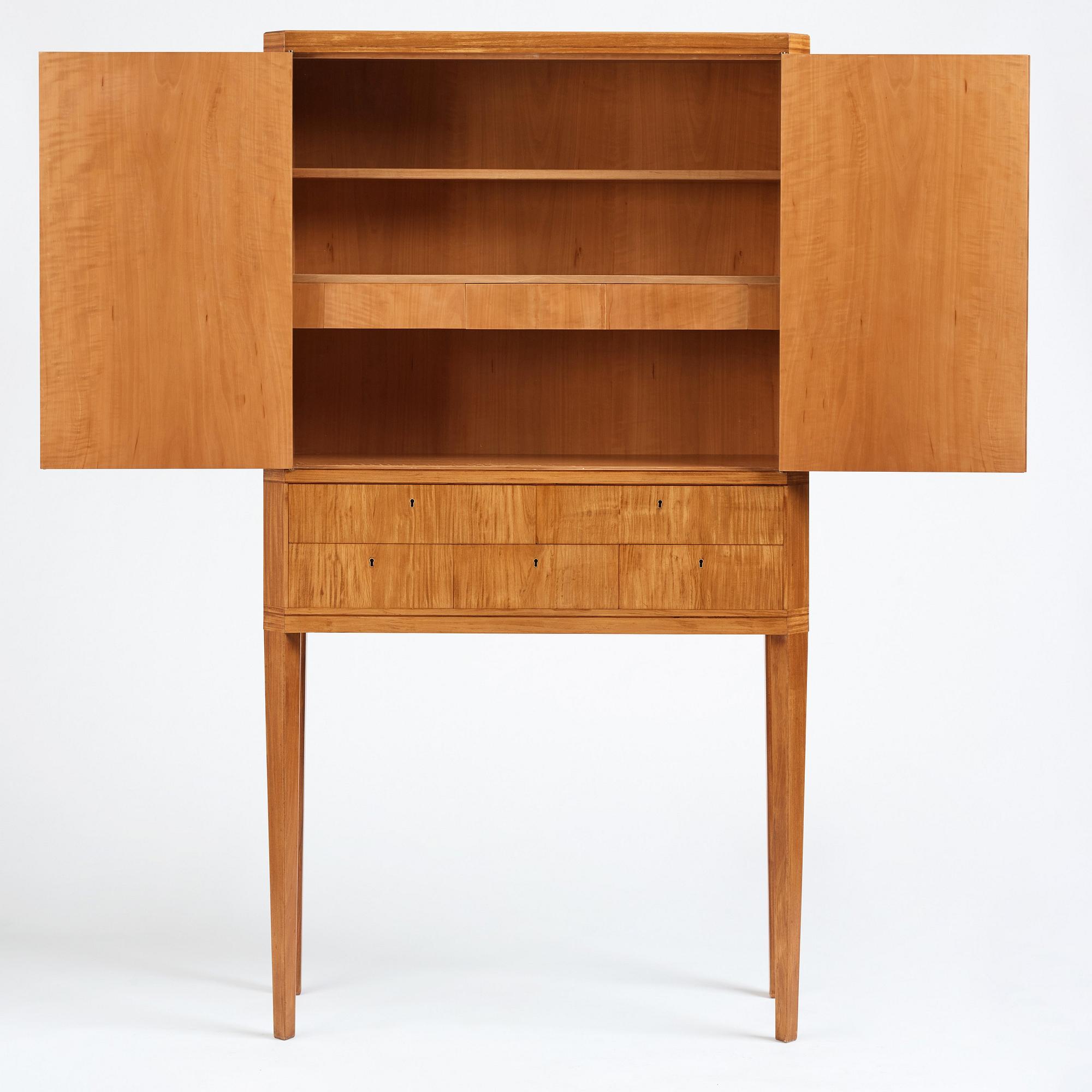 Carl Malmsten, a Swedish Modern cabinet on stand, a journeyman's masterpiece by Sven-Erik Fryklund, Sweden 1942.