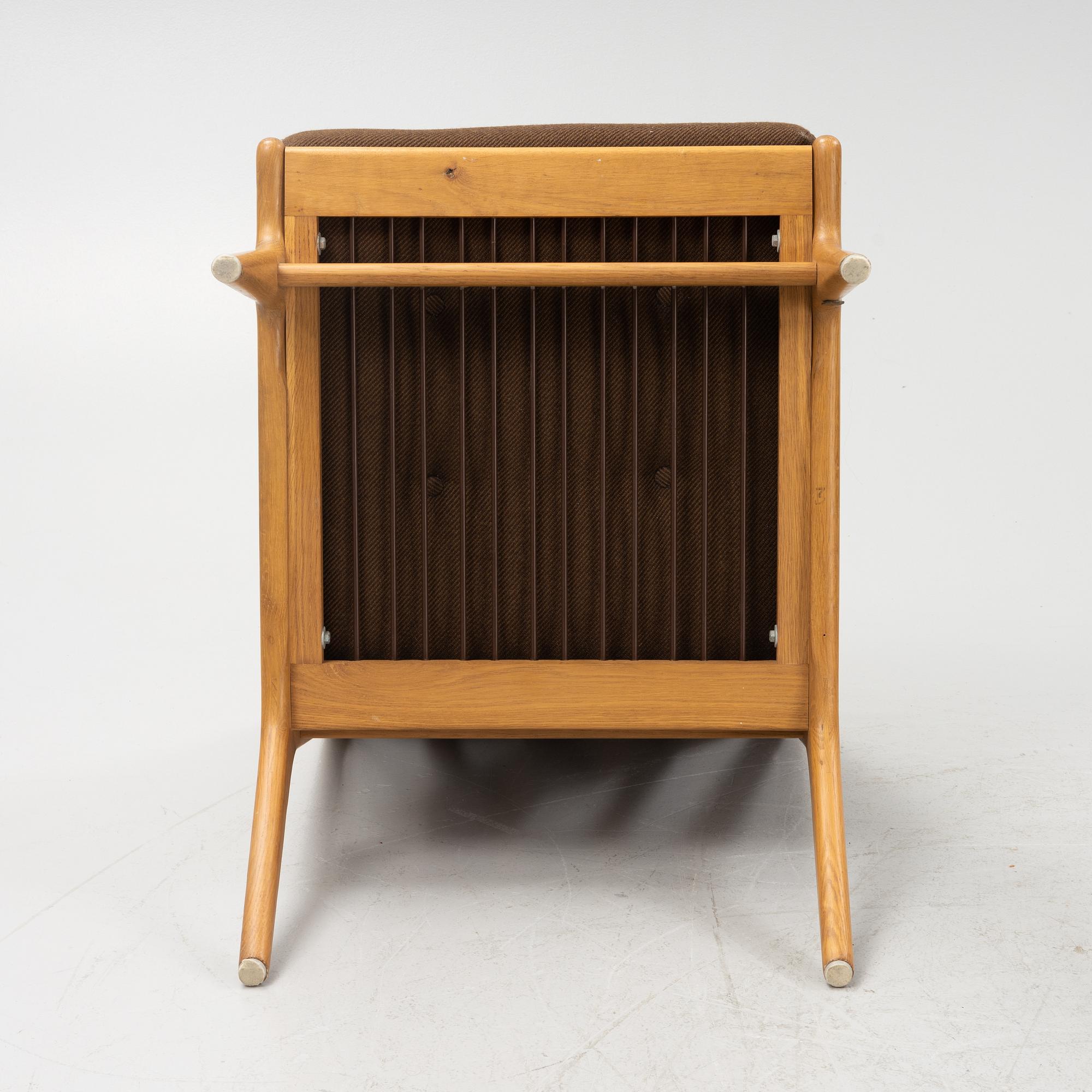 Karl Erik Ekselius, probably. A pair of oak easy chairs, JOC, Vetlanda, 1960's.