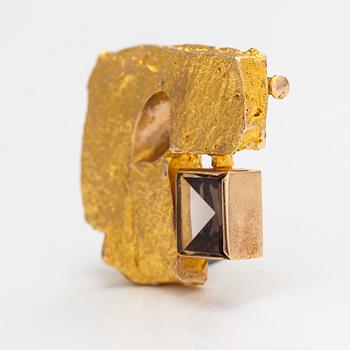 Björn Weckström, A 14K gold brooch "Crystal and cut" with a smoaky quartz. Lapponia 1967.