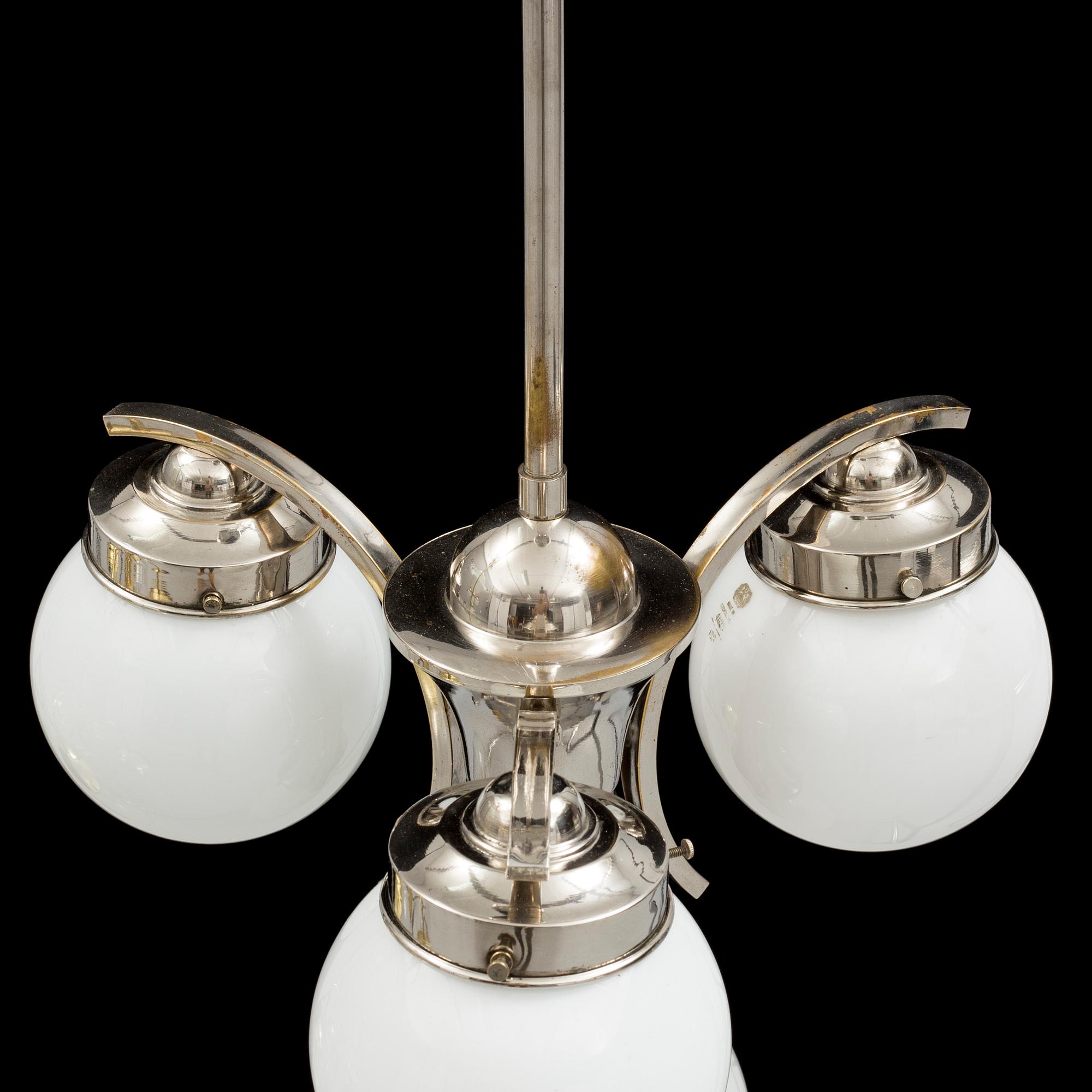 An 1930s Art Deco ceiling light. Total height ca 70 cm.