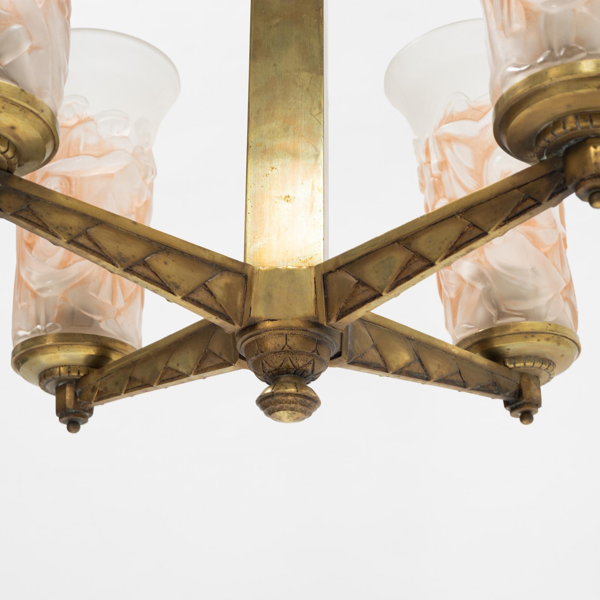 A brass and glass Art Deco ceiling light, probably France, first half of the 20th Century.