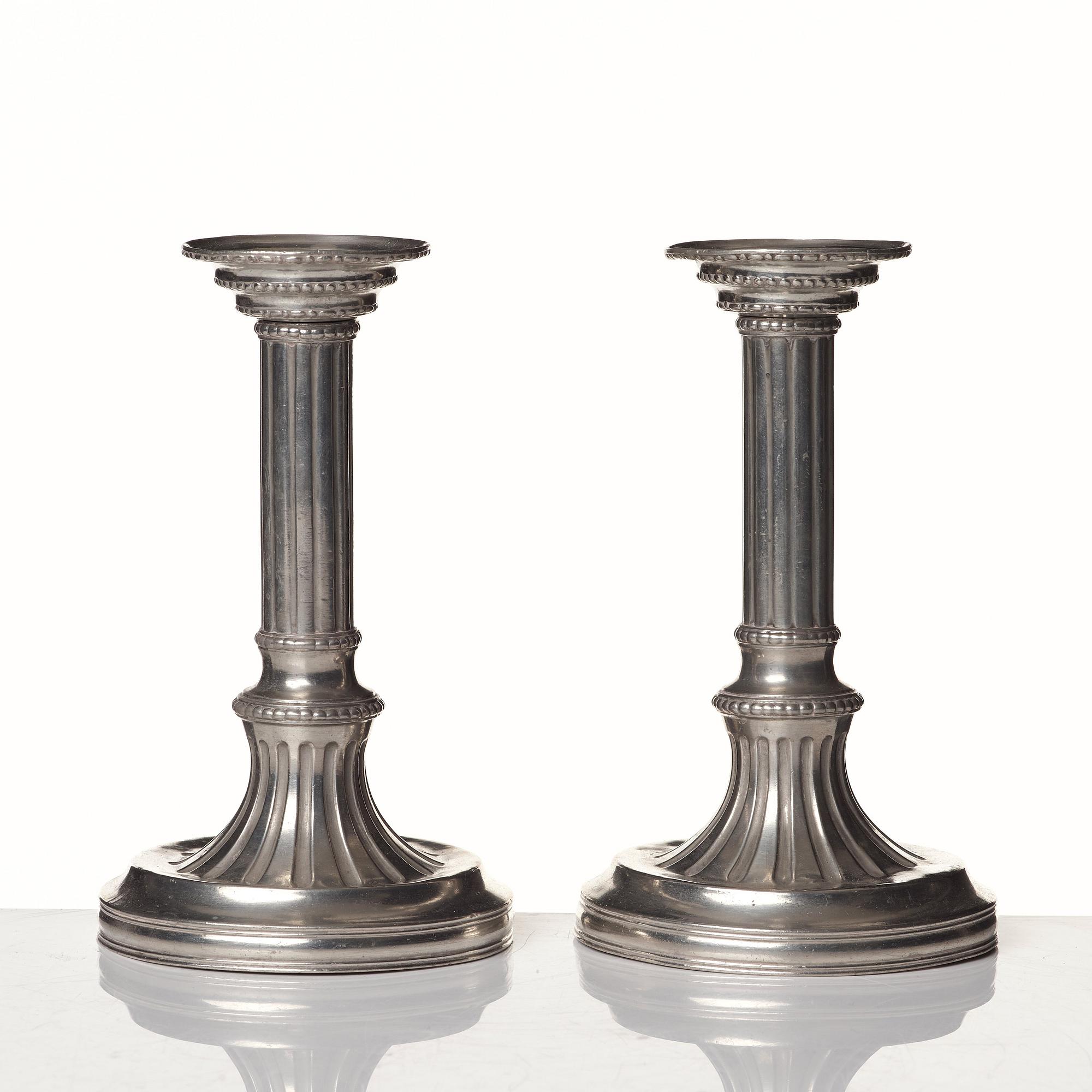 A pair of Gustavian pewter candlesticks by R Ryman 1784.