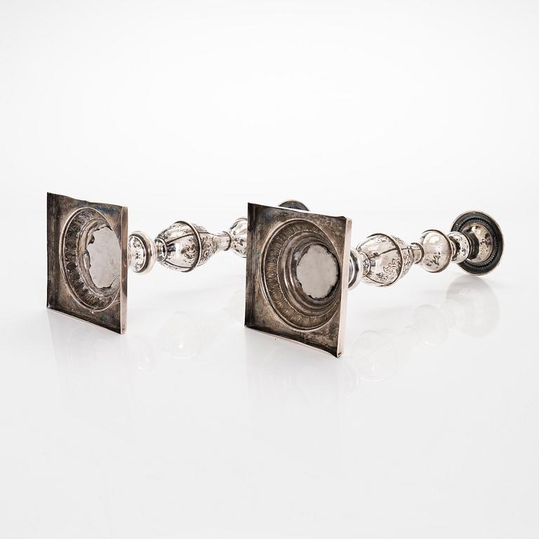 A pair of Sabbath candlesticks in low-grade silver, Poland. Unidentified makers mark.