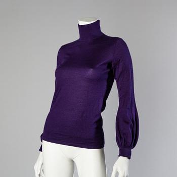 Three sweaters by Ralph Lauren.