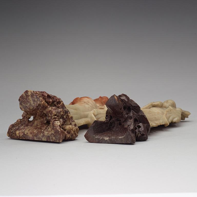 Two soapstone sculptures of immortals, late Qing dynasty, 19th Century.