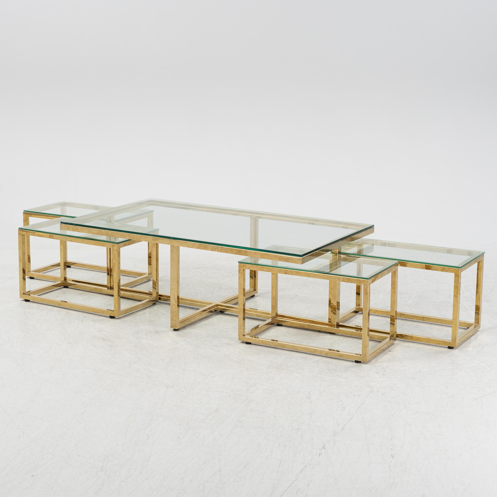 A 21st Century 5 pcs glass coffee table.
