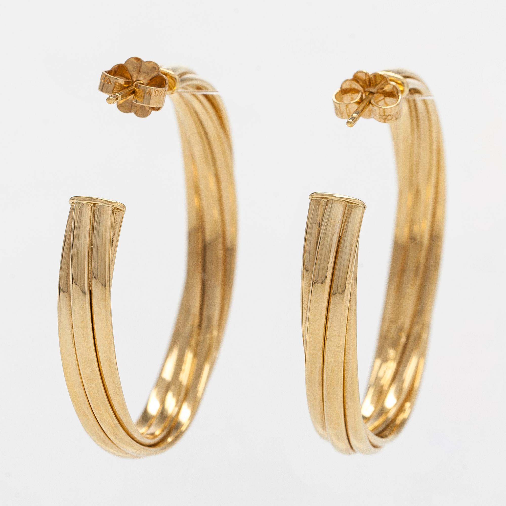 Tiffany & Co, Paloma Picasso, "Melody" hoop earrings in 18K gold.