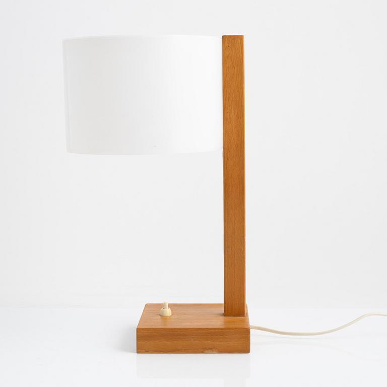 Uno & Östen Kristiansson, a wall light and a table light, Luxus, Vittsjö, Sweden.