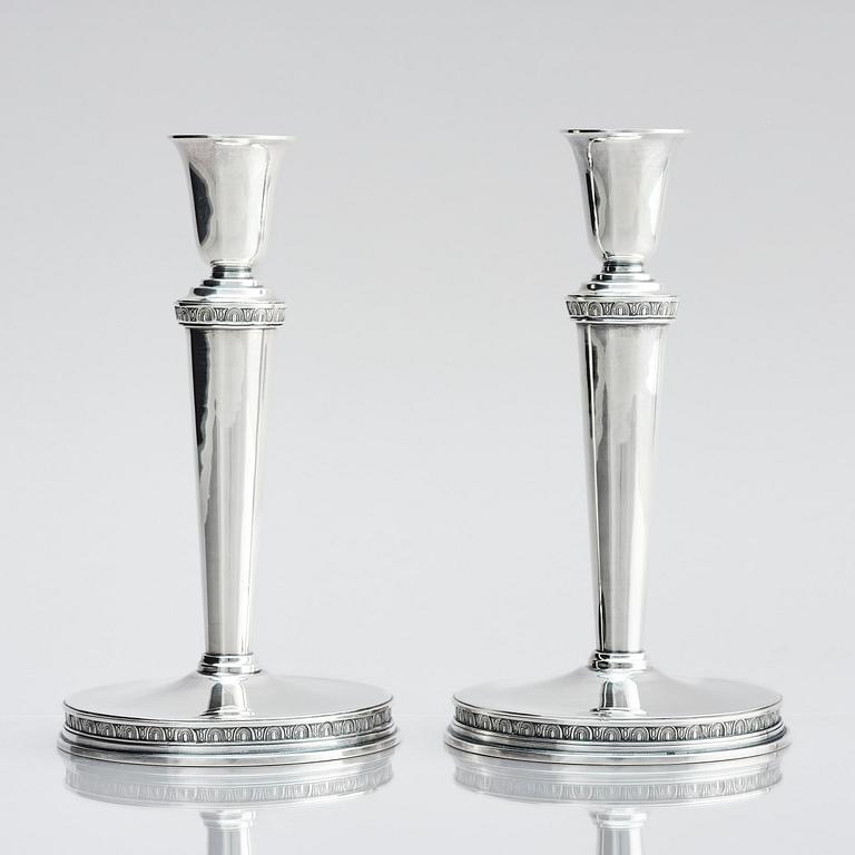Eric Råström, a pair of silver candlesticks, company CG Råström, Stockholm 1974.