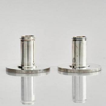 Georg Jensen, a pair of sterling silver candlesticks, design by Sigvard Bernadotte, model no 711A, Copenhagen, Denmark after 1945.