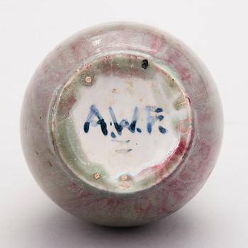 A ceramic vase signed A.W.F.