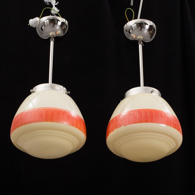 A pair of 1940´s Pukeberg ceiling light. Hieght ca 41 cm.