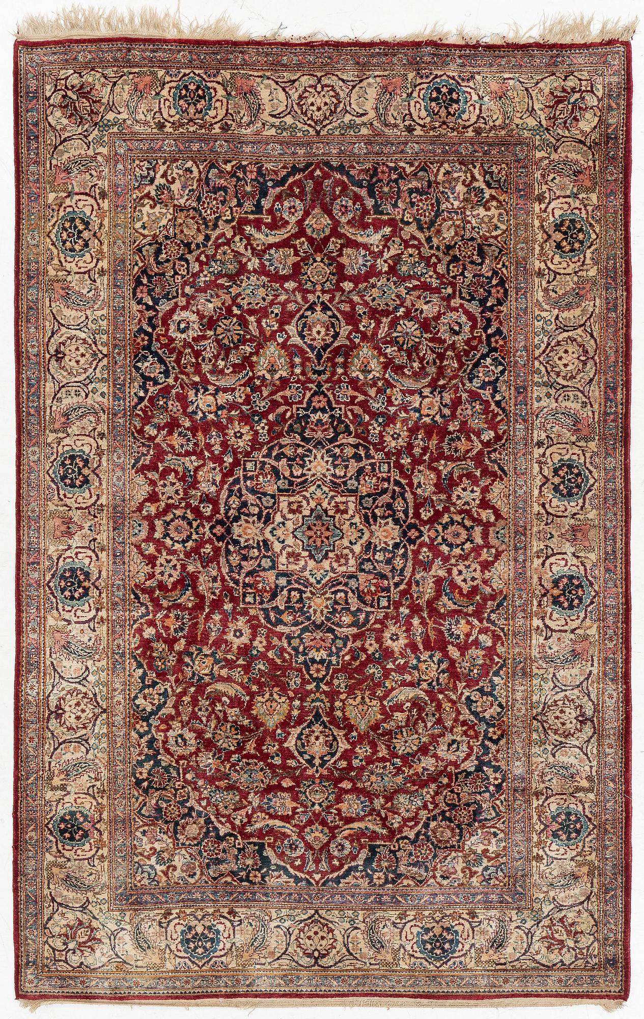 A semi-antique silk Kashan, central Persia, c. 210 x 140 cm.