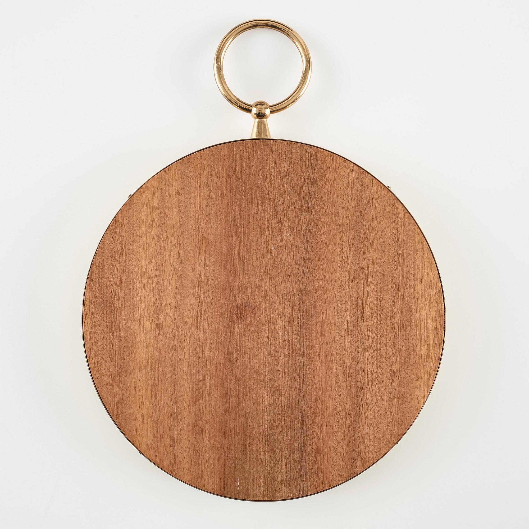 Piero Fornasetti, a brass framed mirror, Milan, Italy.