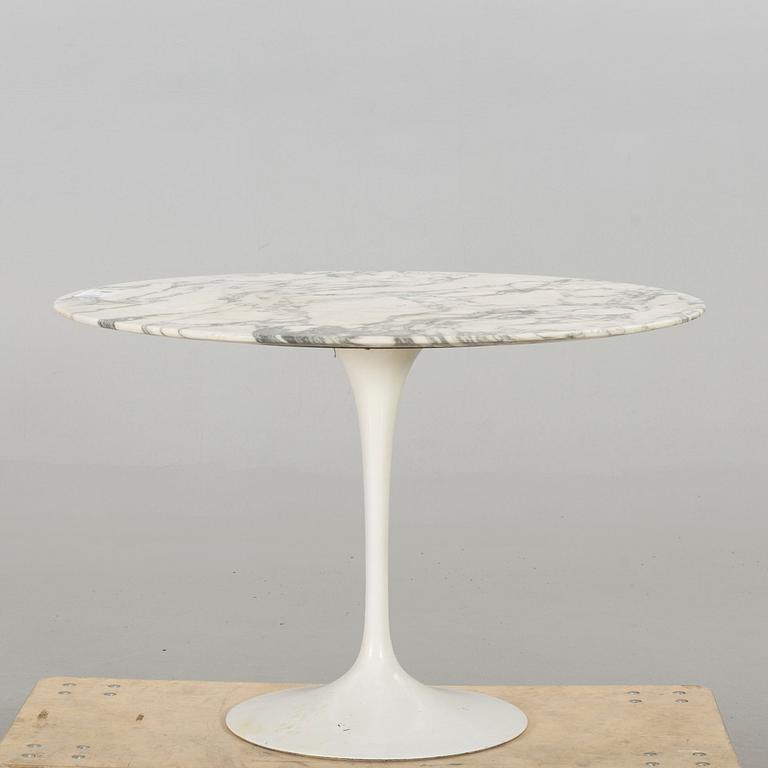 A marble top table later part of the 20th century.