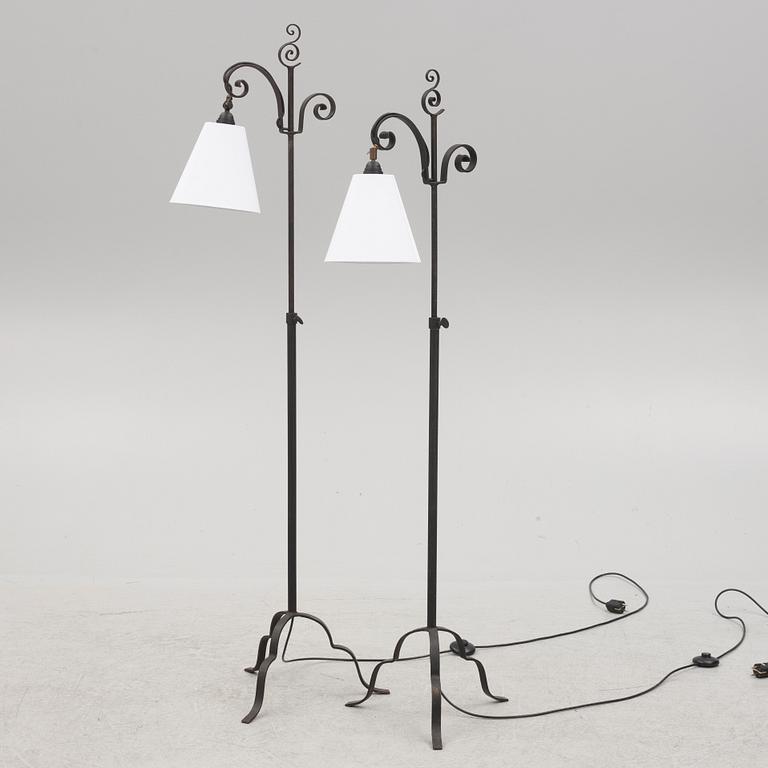 Harald Notini, a pair of wrought iron floor lamps, model '15101', Arvid Böhlmarks Lampfabrik, 1930's.