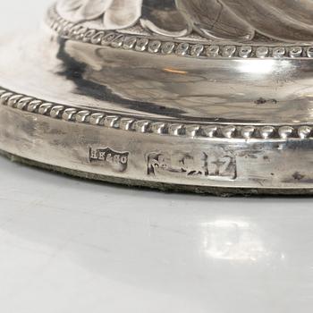 A pair of English silver candelabra, mark of Hawksworth, Eyre & Co Ltd, Sheffield 1892.