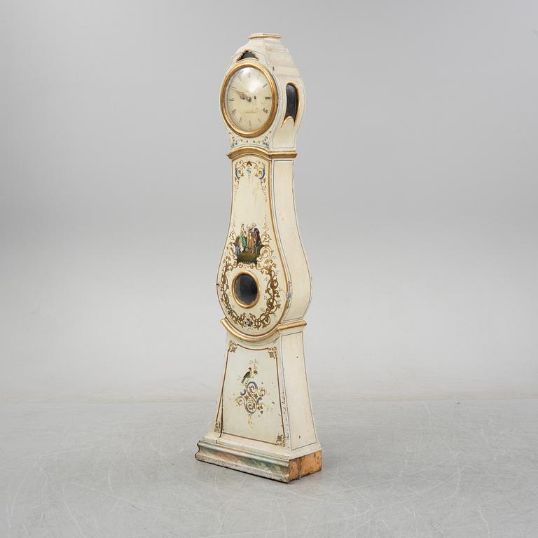 An 18th Century painted long case clock.