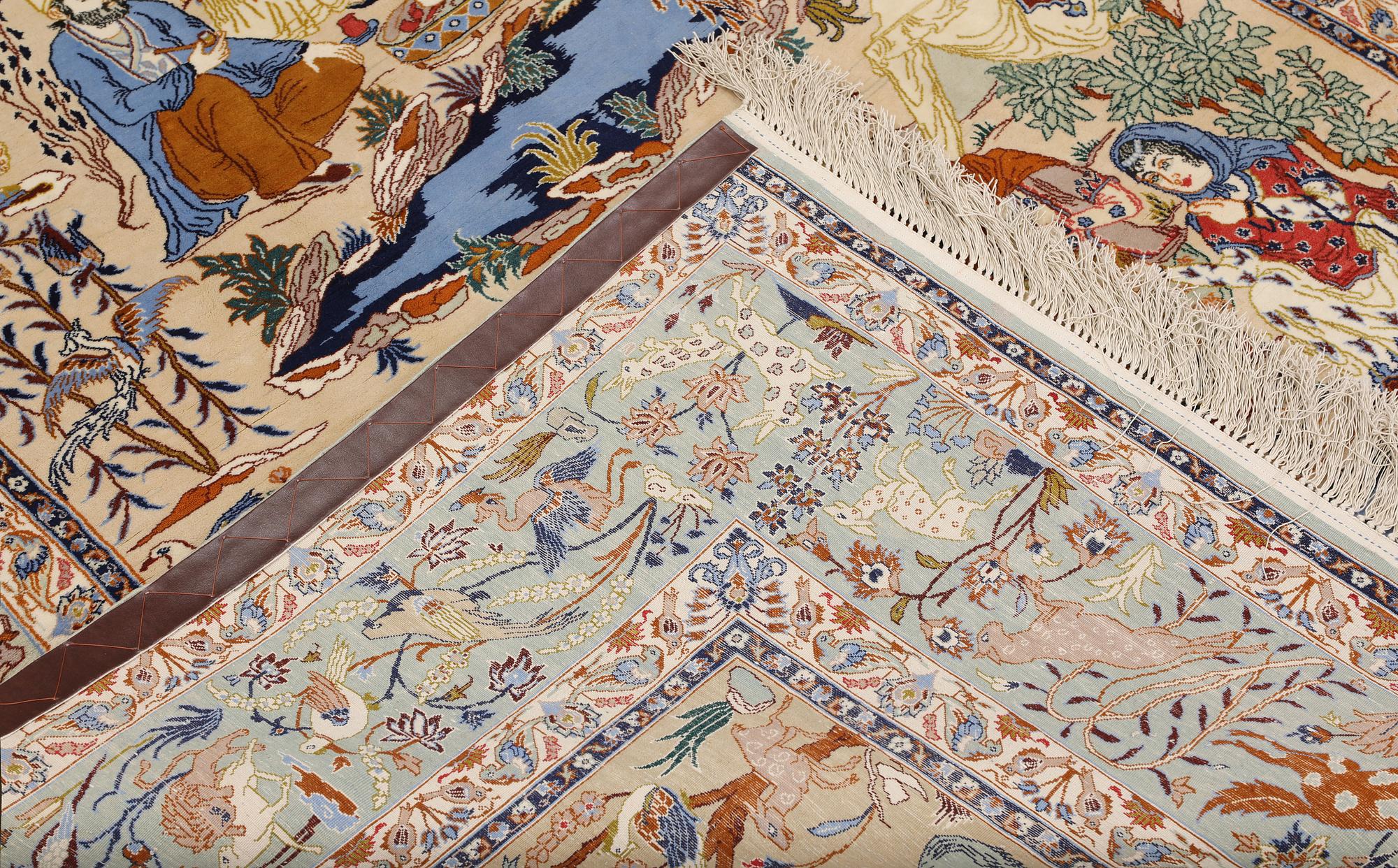 A Figural Isfahan carpet, part silk, 238 x 160 cm.