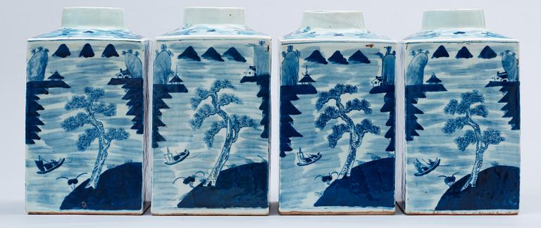 A set of four blue and white large tea caddies in a wooden box, Qing dynasty, circa 1900.
