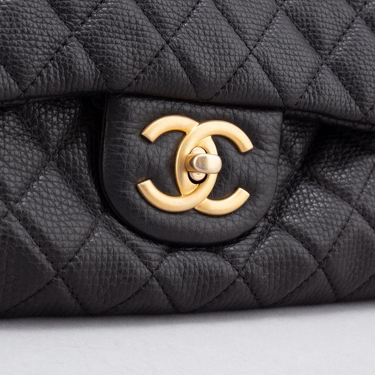 Chanel, a black, quilted leather 'Timeless Flap Bag XXL', 2017-2018.