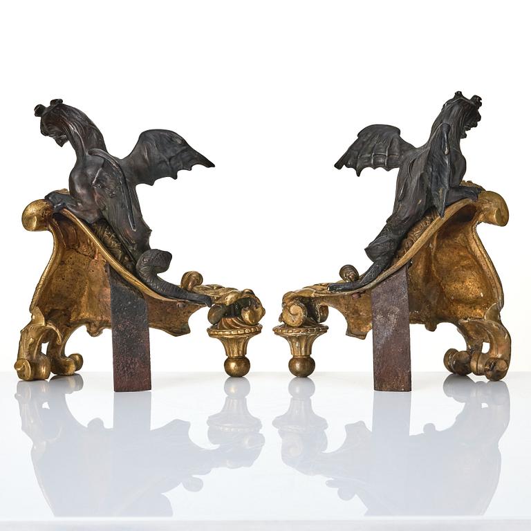 A pair of Rococo style 19th century  gilt and patinated bronze dragon chenets.