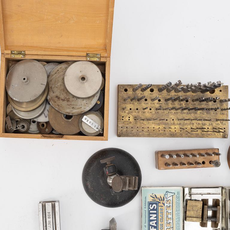 Watchmaking tools and spare parts, including a lathe by Lorch.