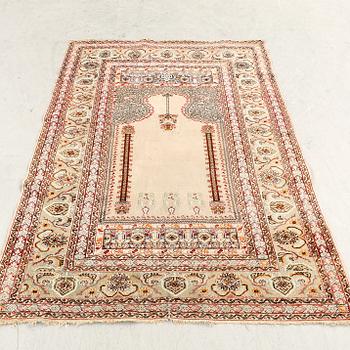 A semiantique/antique Ghiordes carpet ca 178x123 cm.