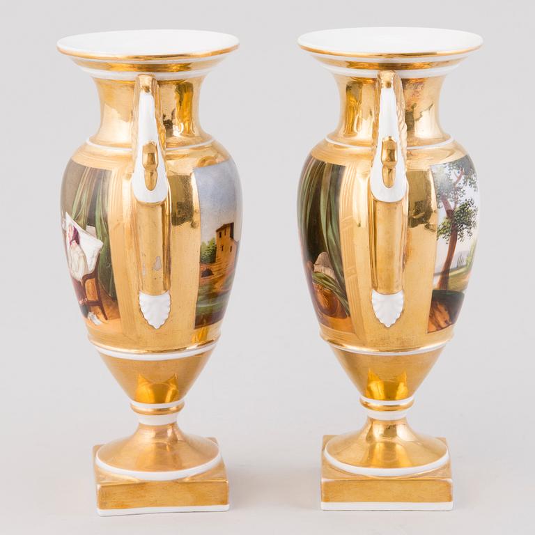 A pair of 19th century porcelain urns / vases.