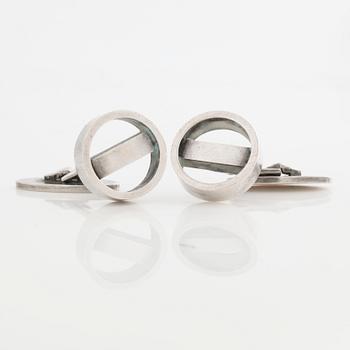 A pair of cuff links by Georg Jensen.