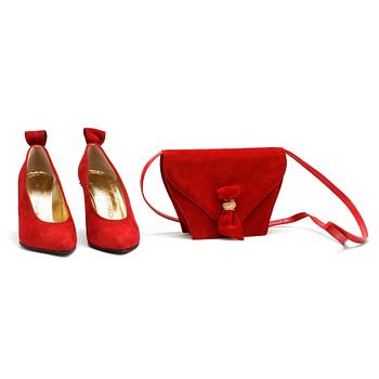 856. CHARLES JOURDAN, a pair of red suede pumps with matching shoulder bag.