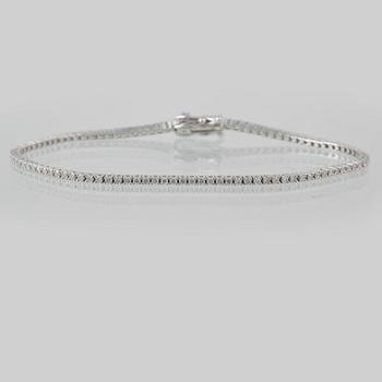 ARMBAND, 18K vitguld med briljantslipade diamanter ca 1.16 ct. Vikt 5,3 gram.