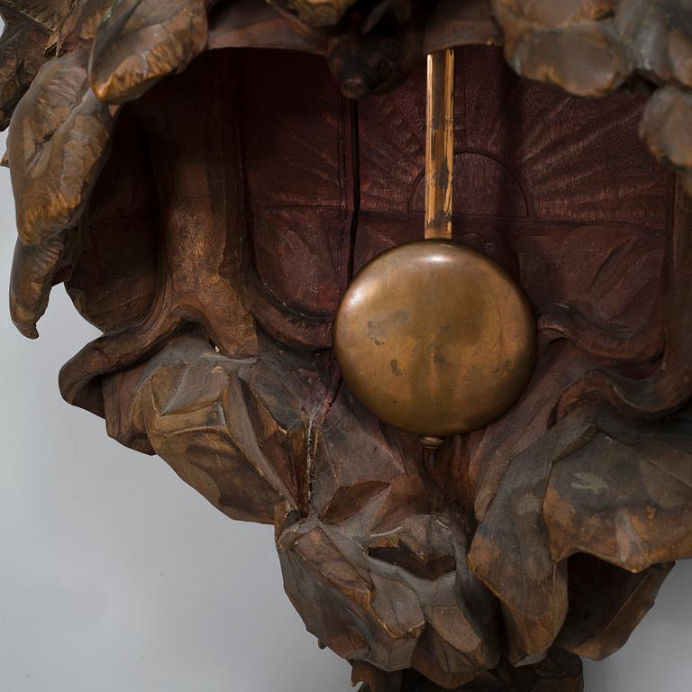 A wall clock by CARL CHRISTIAN CHRISTENSEN, signed and dated 1905.