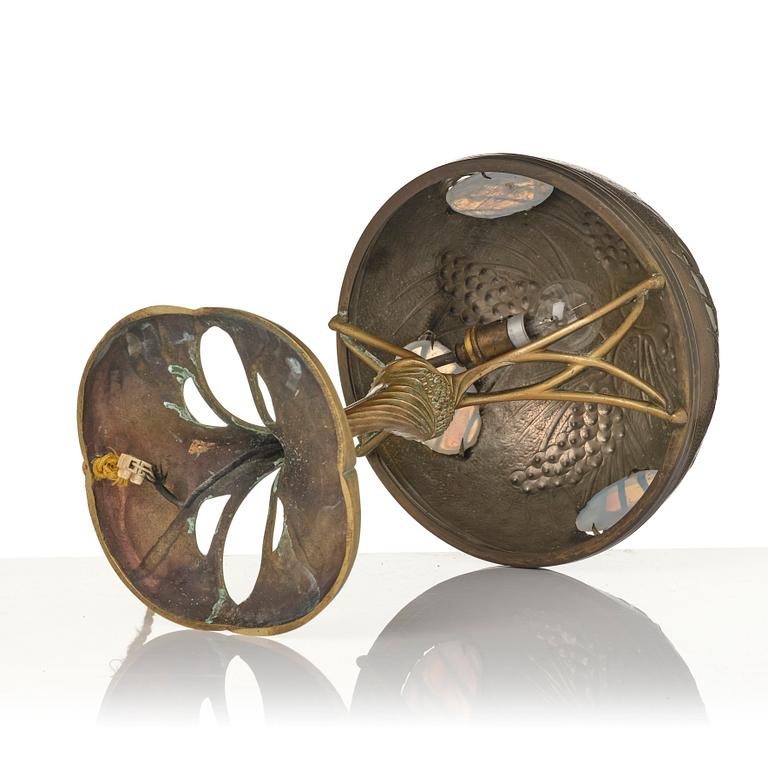 A bronze and brass table lamp, with signature Georges Leleu.