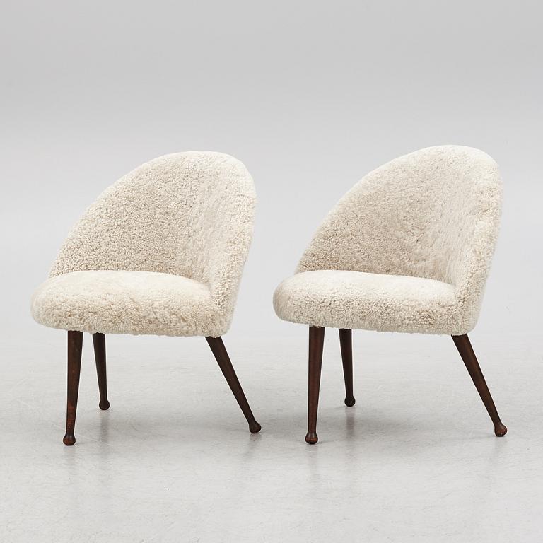 A pair of Scandinavian Modern lounge chairs, 1950's.