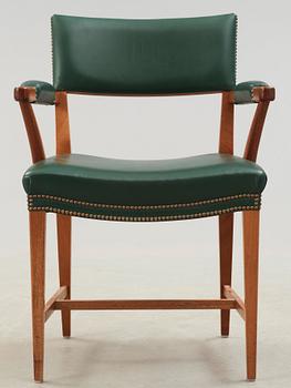 A Josef Frank mahogany and green leather armchair, Svenskt Tenn, model 695.