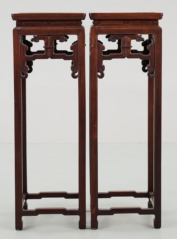 A set of two hardwood pedestals, presumably late Qing dynasty.