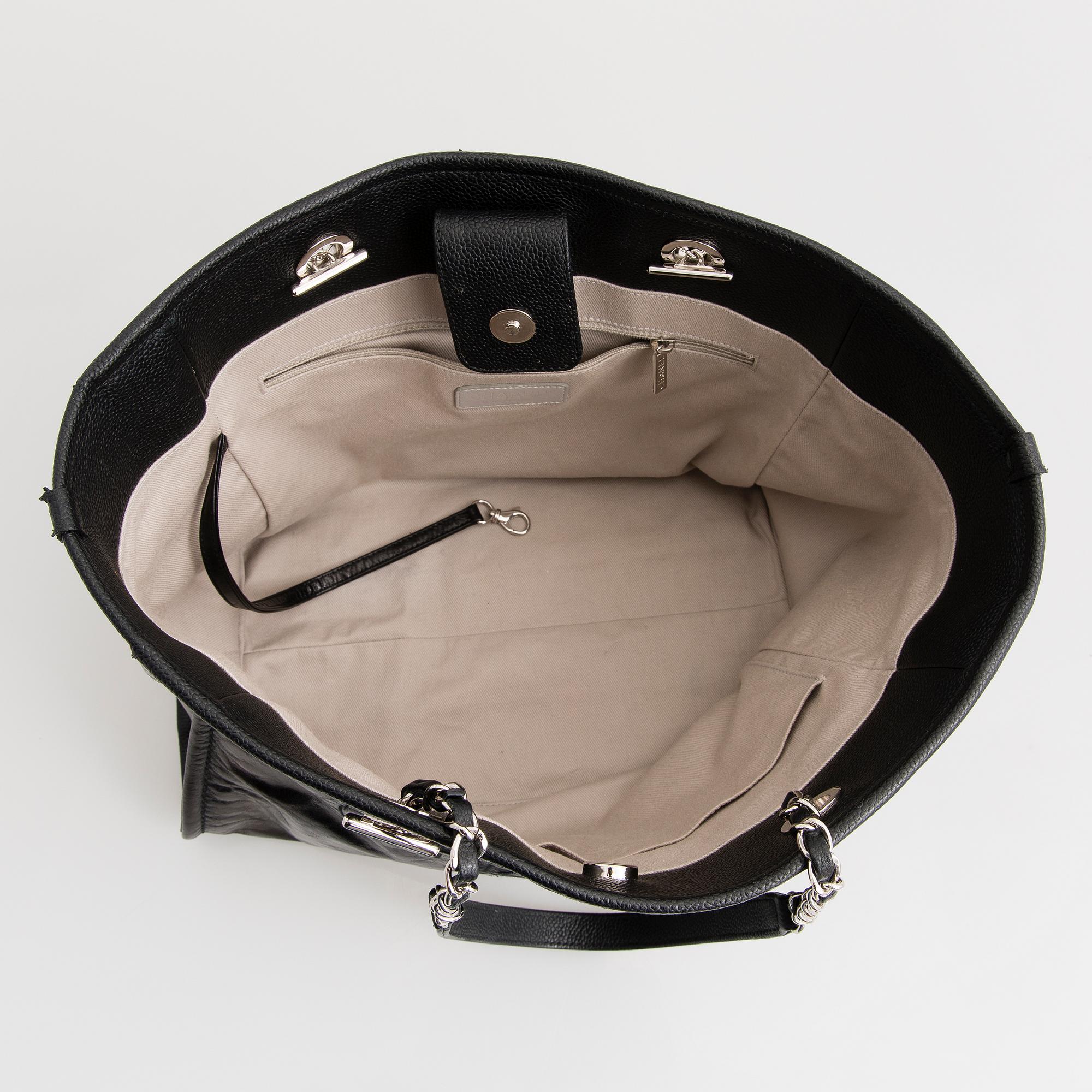 CHANEL, A Large Black Leather Shopping Bag.