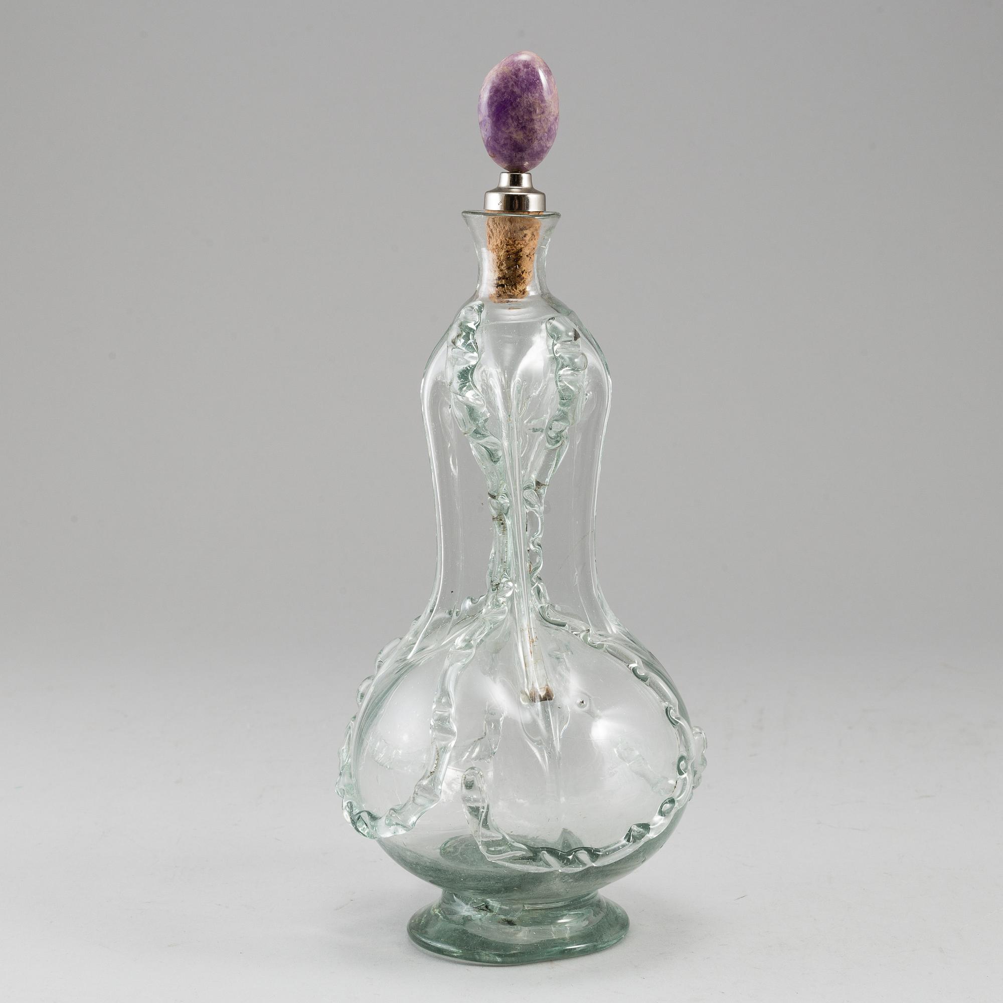 A glass bottle, 18/19th Century.