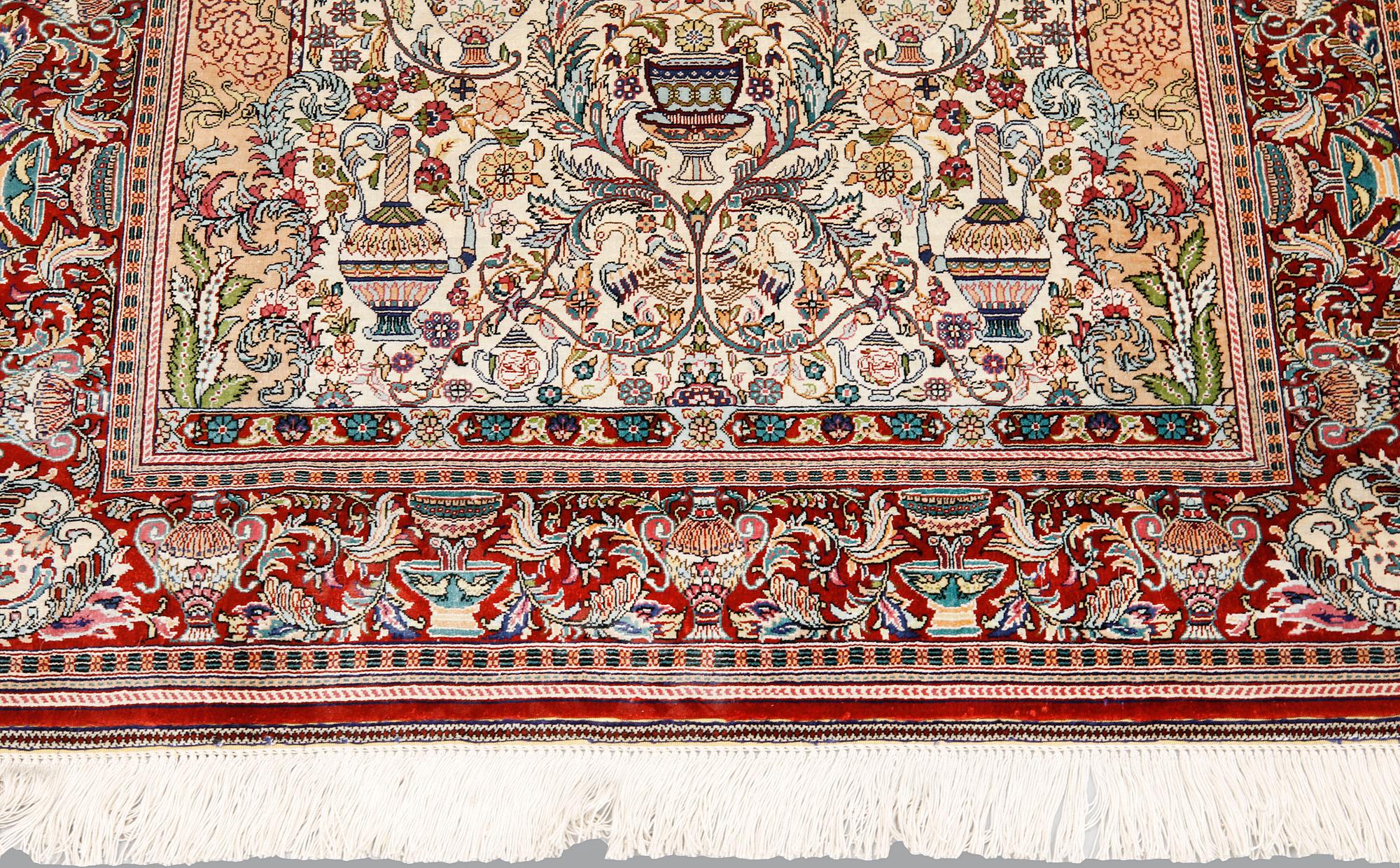 A oriental silk rug, 155 x 93 cm.