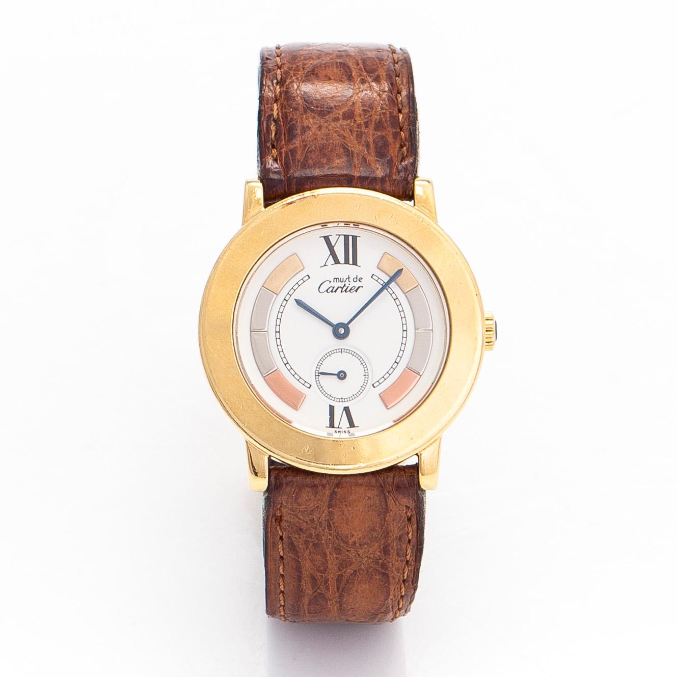Cartier, Must de Cartier Ronde, 33 mm, gilded silver, quartz, sapphire crystal, 2000.