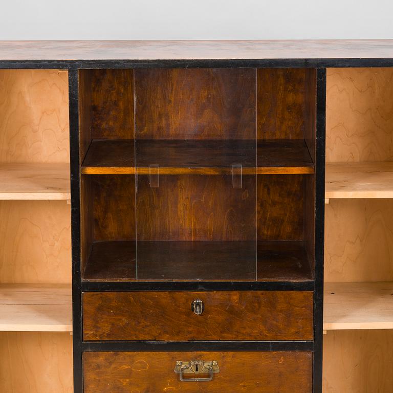 A 1930s functionalist style cabinet.