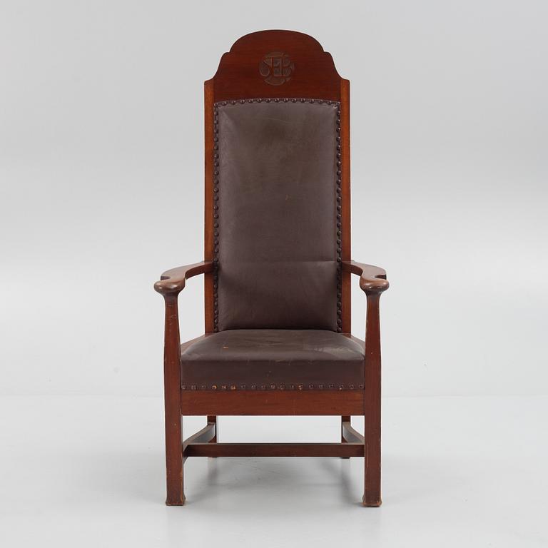Ordförandestol, "SEB", utförd till Stockholms Enskilda Bank, signerad och daterad 1907.