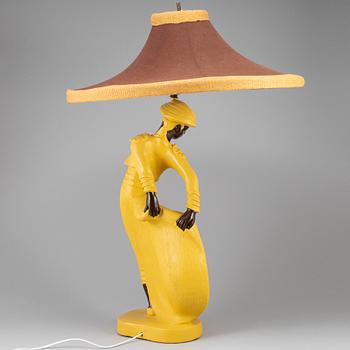 A ceramic table lamp, signed 1951.