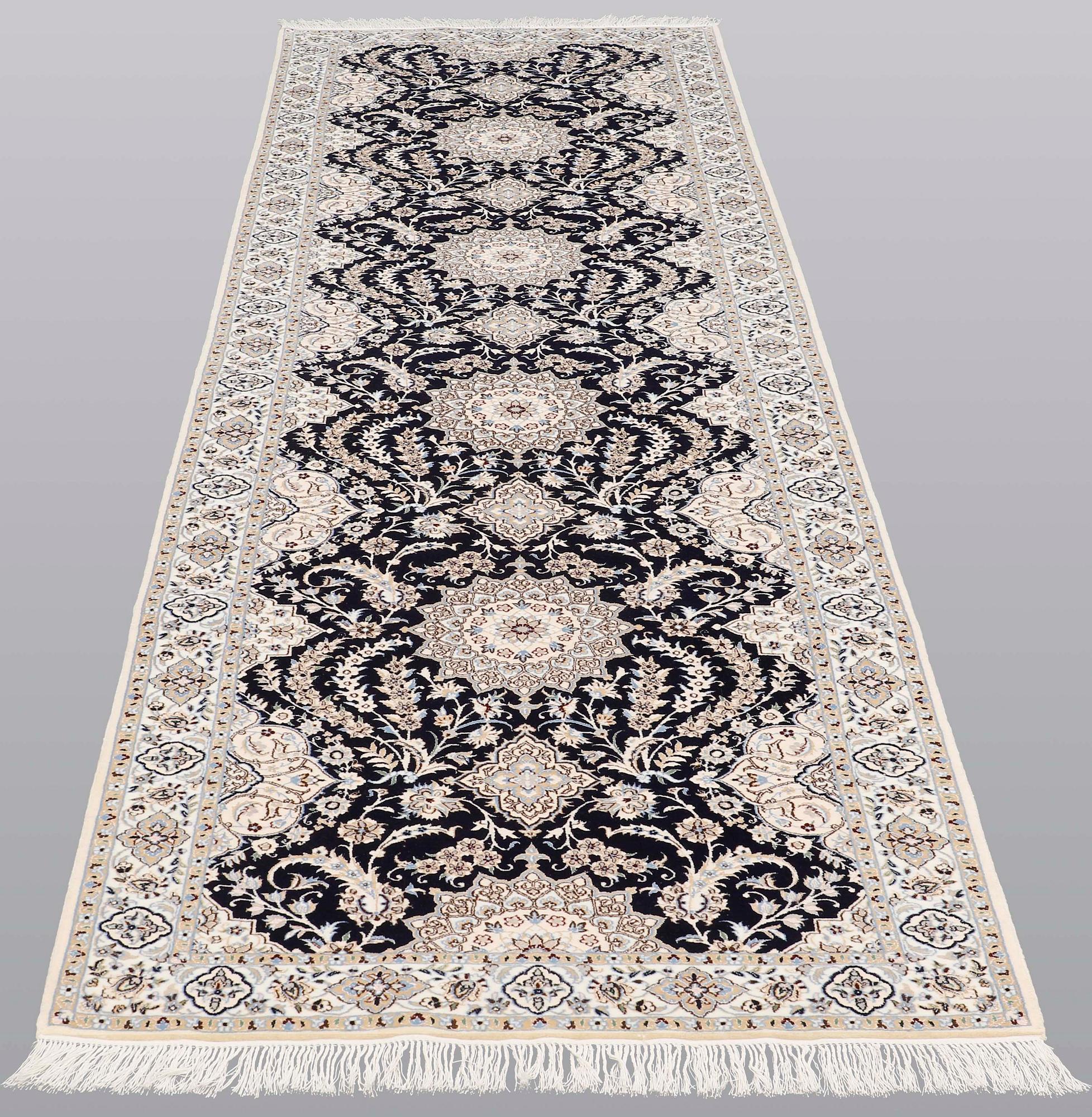 A Nain runner carpet, part silk Sk 6LAA, 337 x 103 cm.