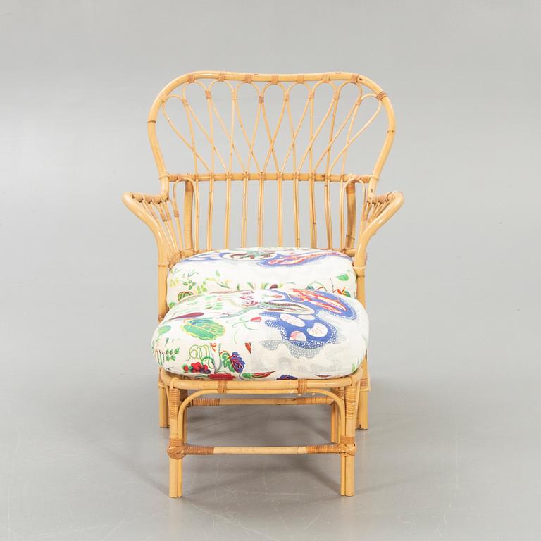 Josef Frank, Armchair with footstool, Firma Svenskt Tenn, model 311.