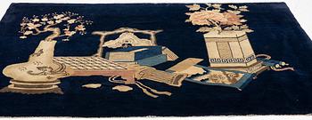 A semi-antique Baotou rug, approx. 185 x 122 cm.