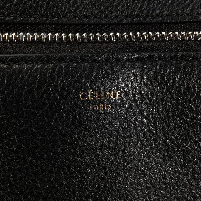 HANDBAG, "Large Edge Bag", Céline, 2013. Black leather with silver-tone hardware, pocket at back with snap closure.