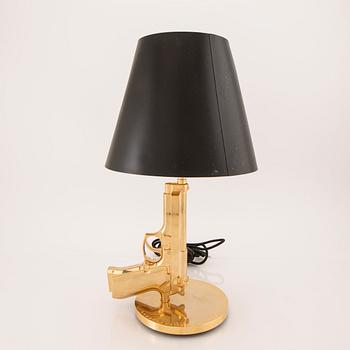Philippe Starck, table lamp, "Gun bedside Lamp", Flos, Italy.