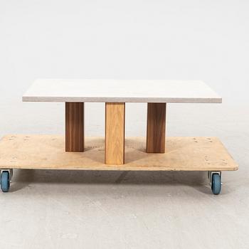A 21st century limestone coffee table.